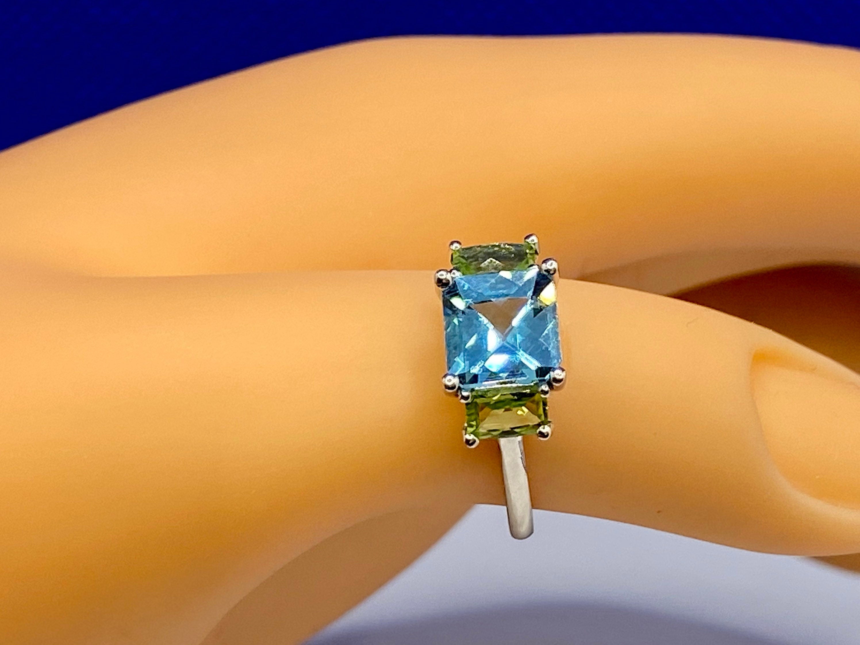 14K White Gold Emerald Cut Aquamarine and Peridot Ring