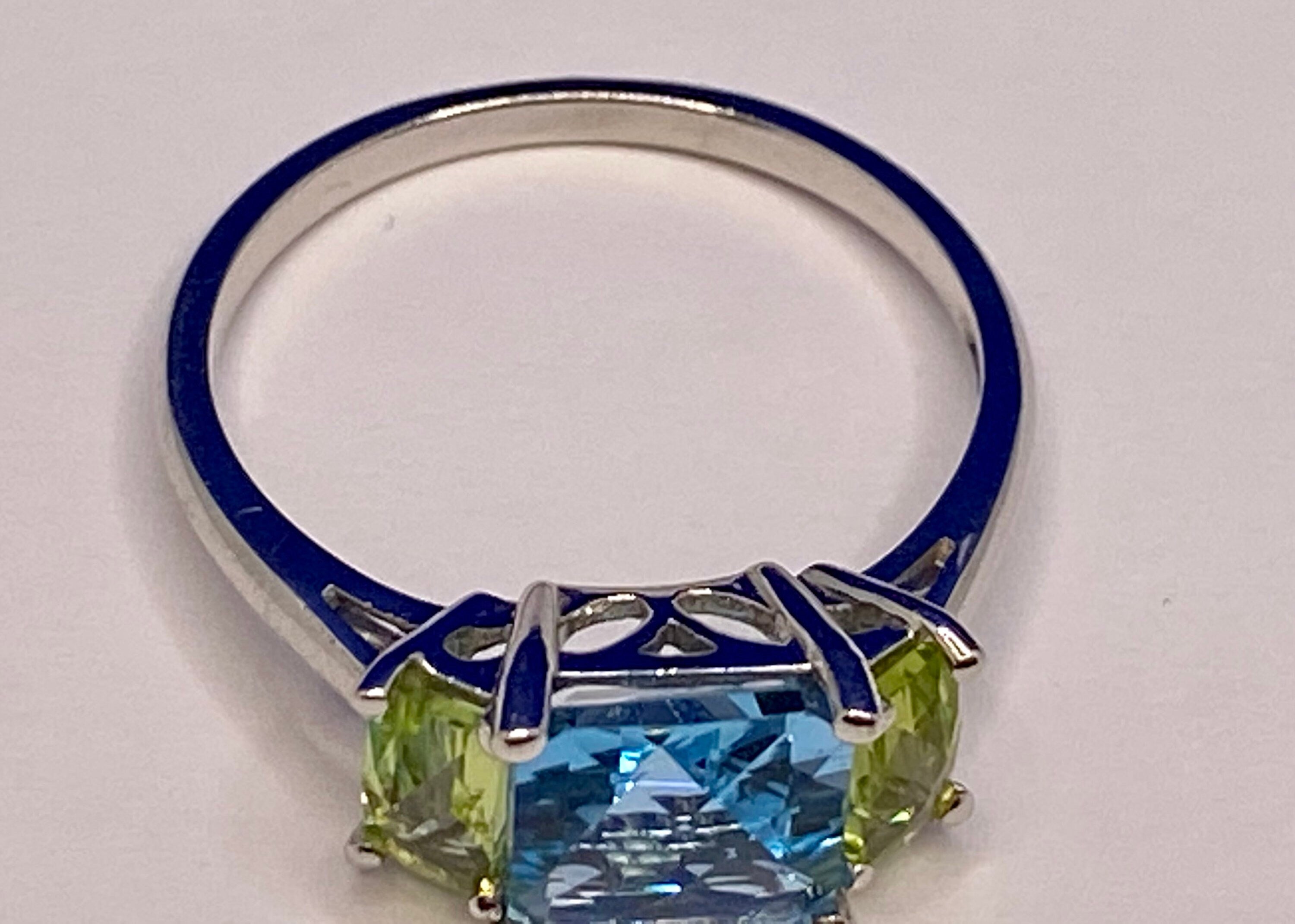 14K White Gold Emerald Cut Aquamarine and Peridot Ring