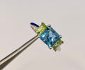 14K White Gold Emerald Cut Aquamarine and Peridot Ring