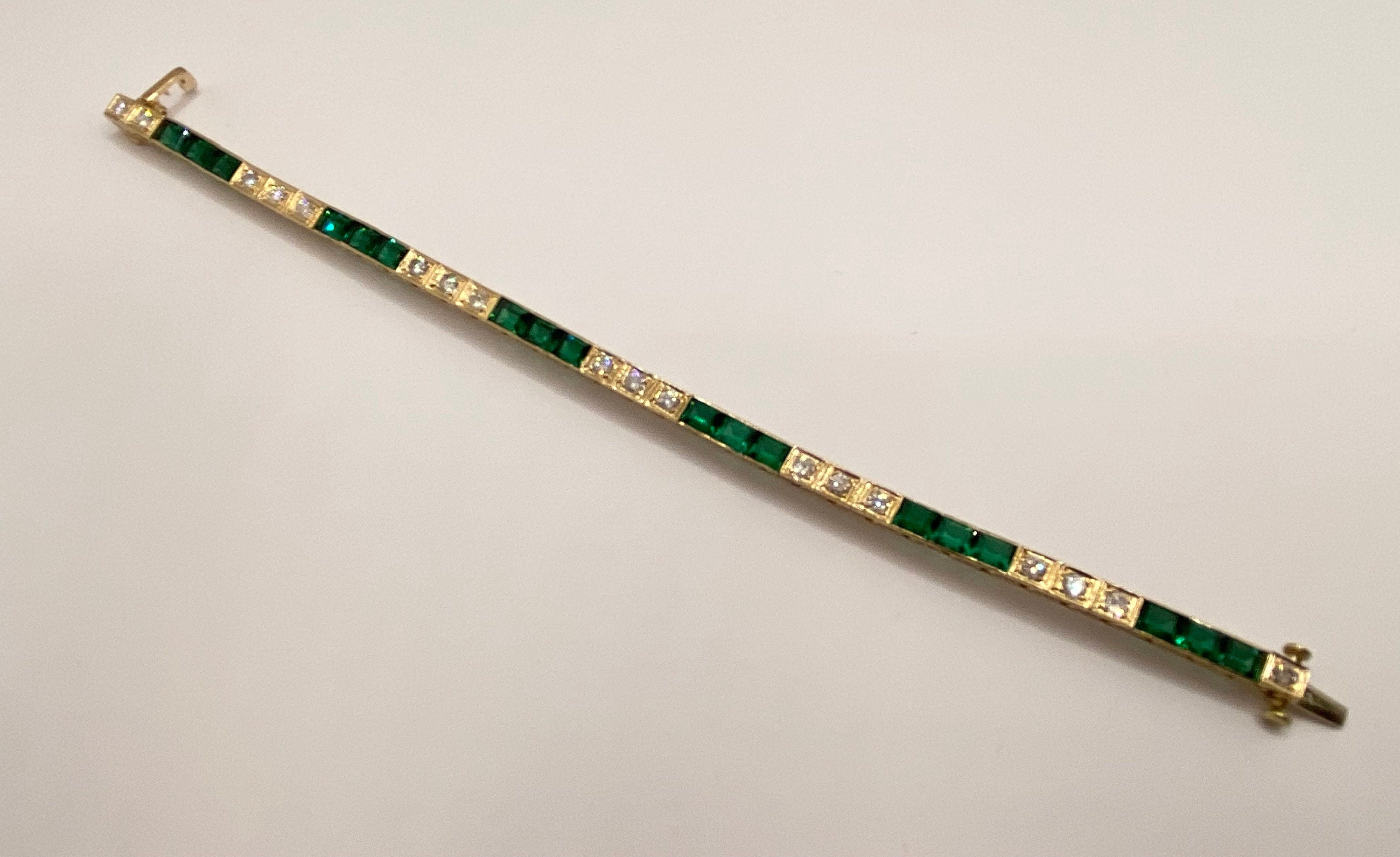 14K Yellow Gold Diamond And Emerald Tennis Bracelet!!!!