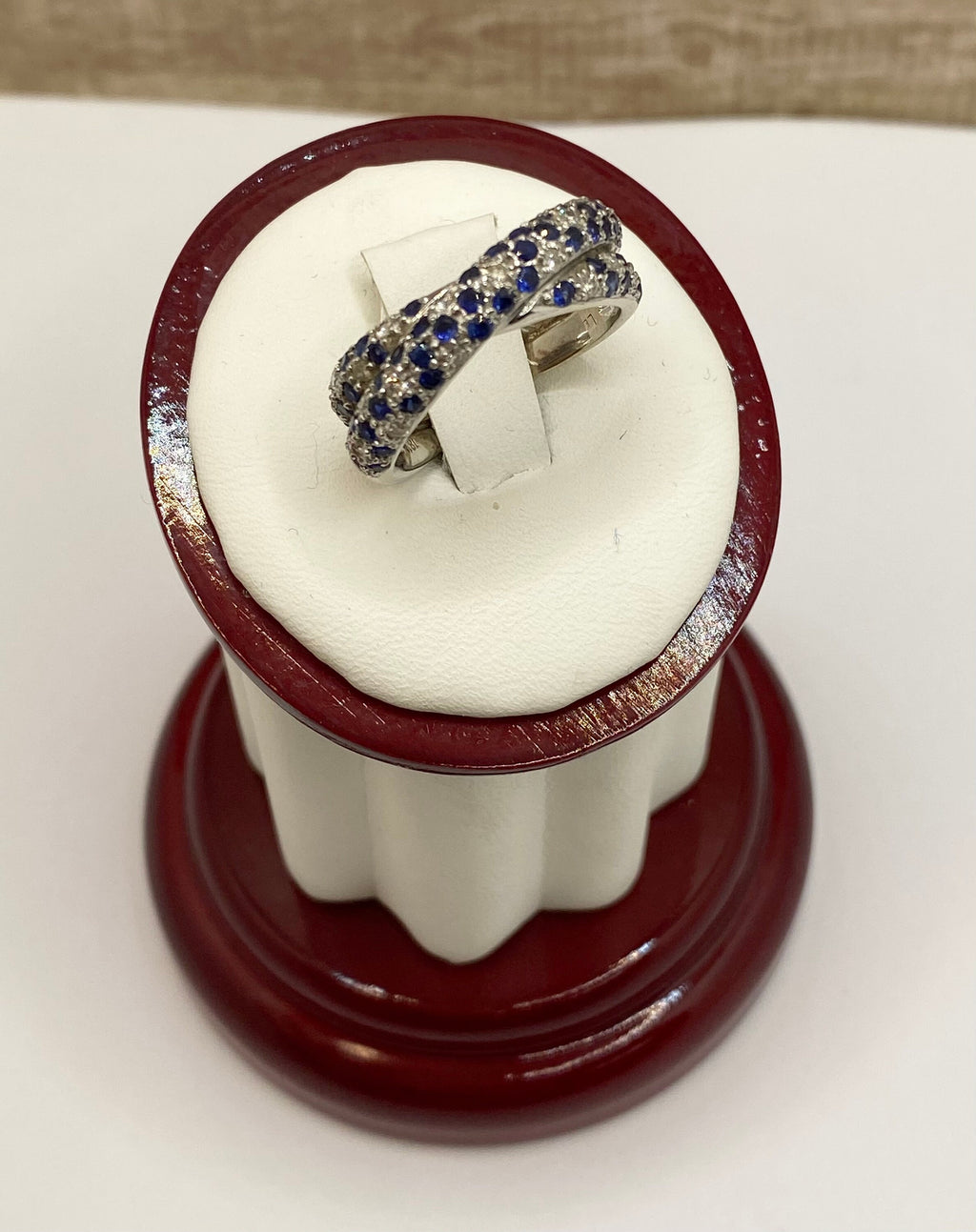 18K White Gold Twisted Ring: Sapphire and Diamond Accent