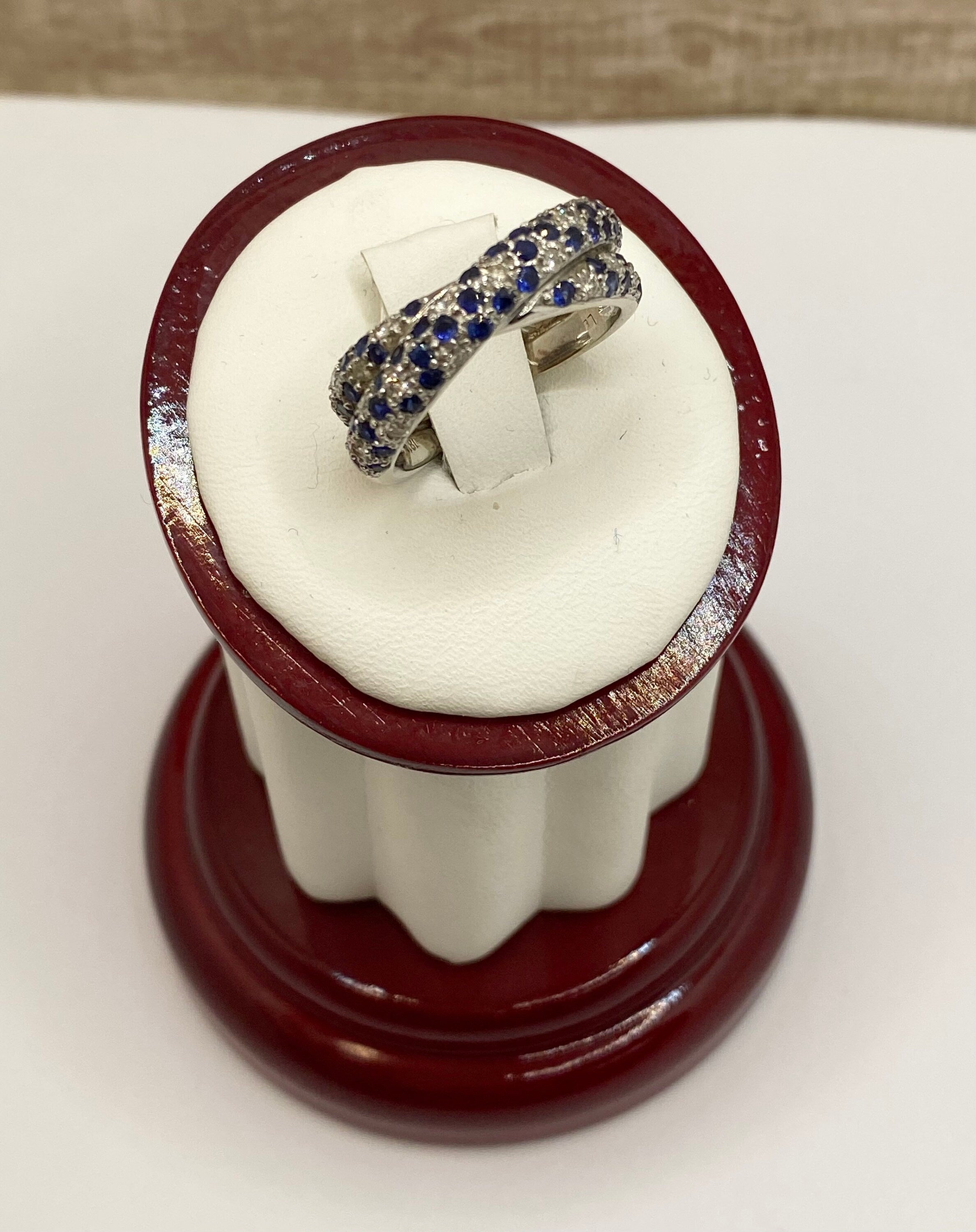 18K White Gold Twisted Ring: Sapphire and Diamond Accent