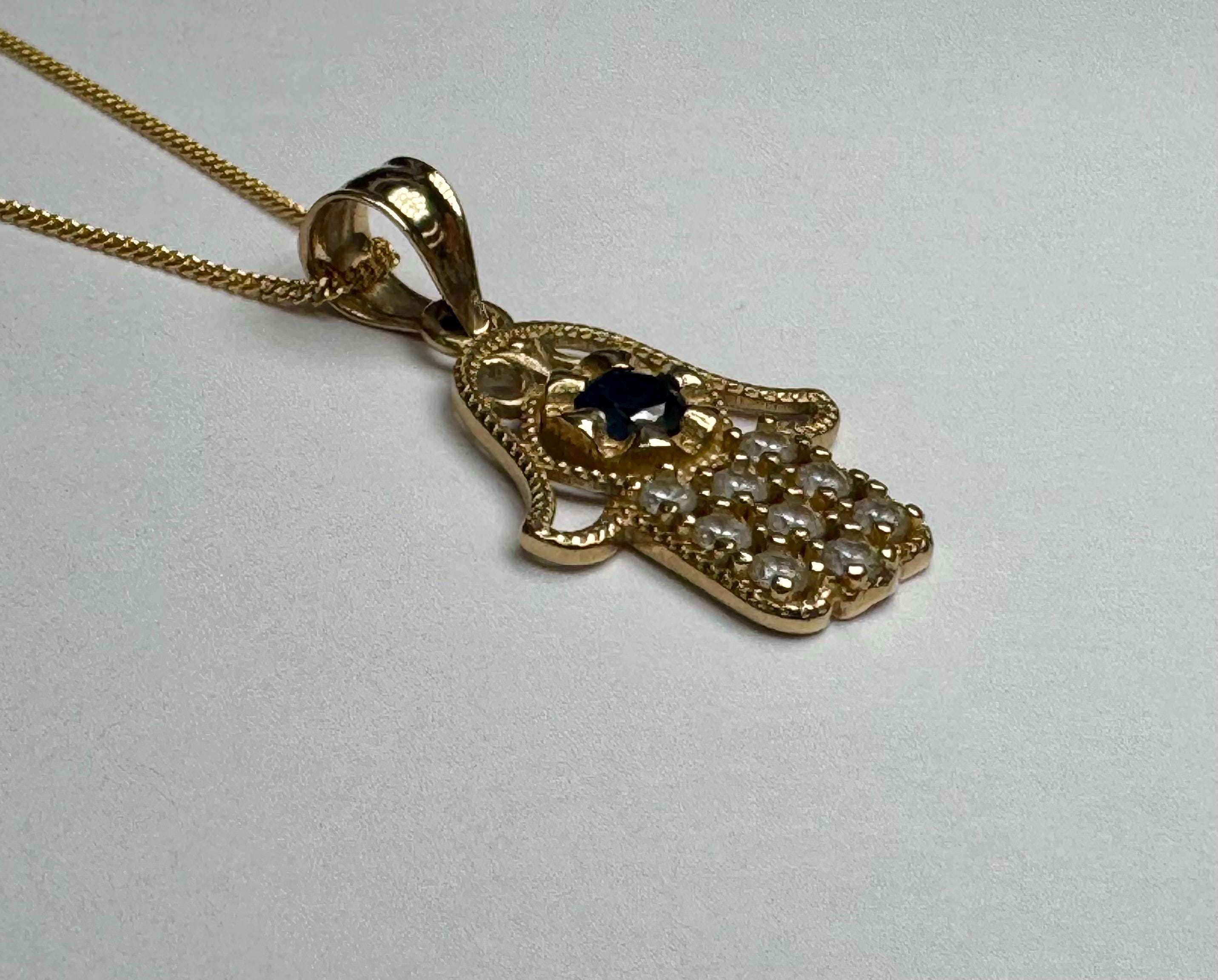 14K Yellow Gold Hamsa Hand Pendant with Blue & White CZ