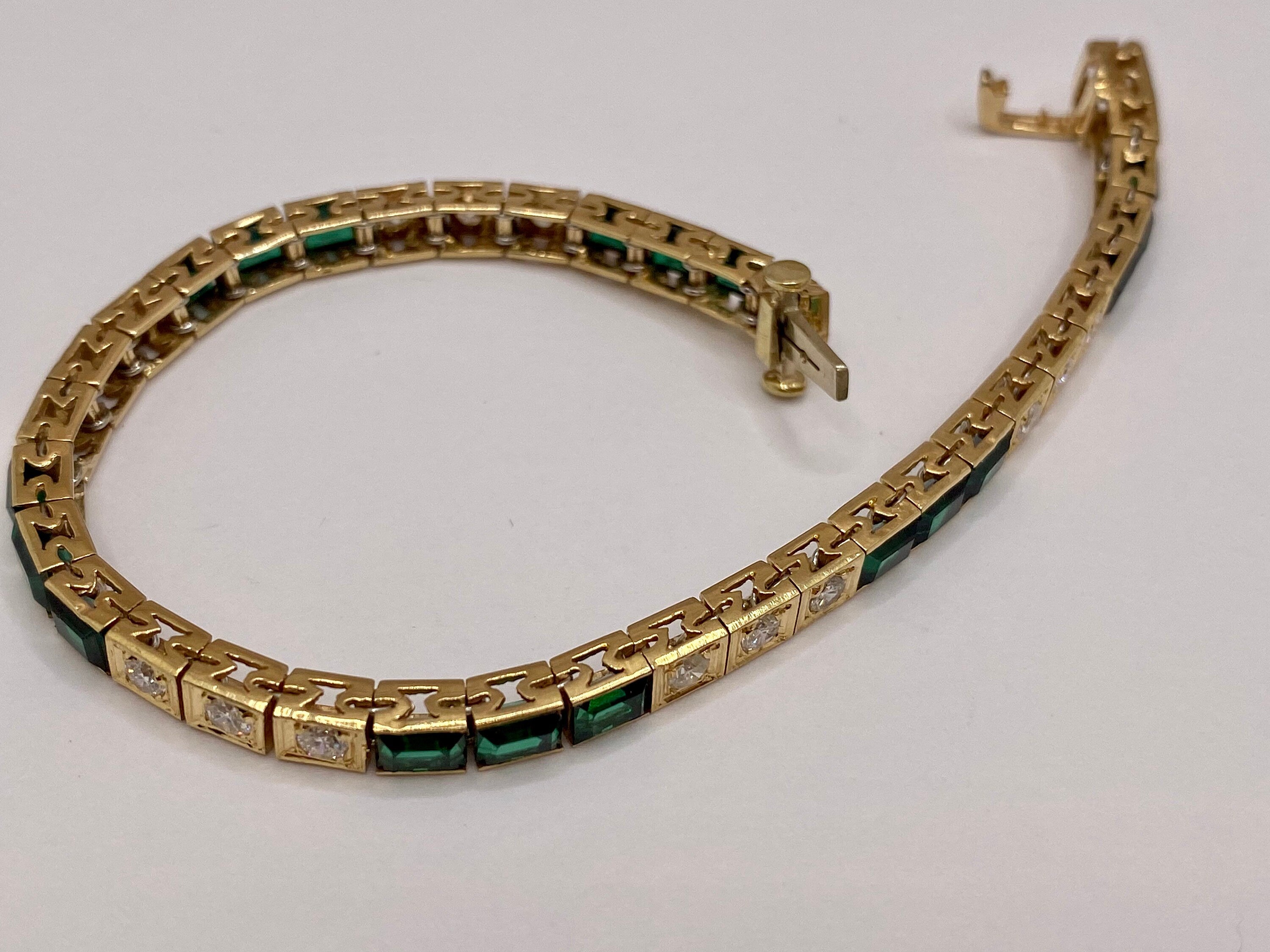 14K Yellow Gold Diamond And Emerald Tennis Bracelet!!!!
