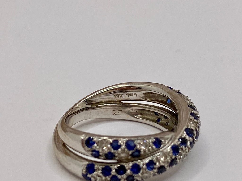 18K White Gold Twisted Ring: Sapphire and Diamond Accent