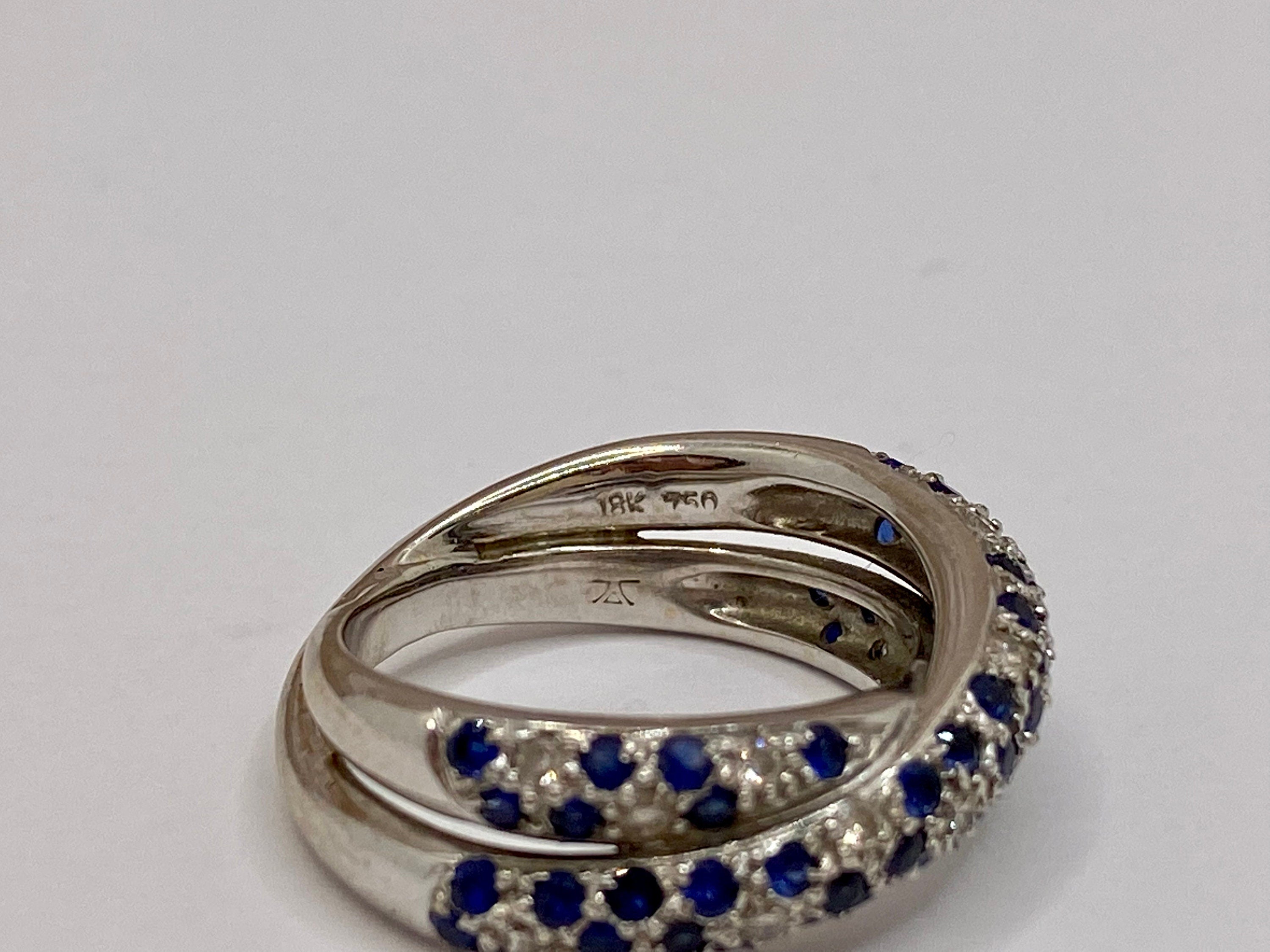 18K White Gold Twisted Ring: Sapphire and Diamond Accent