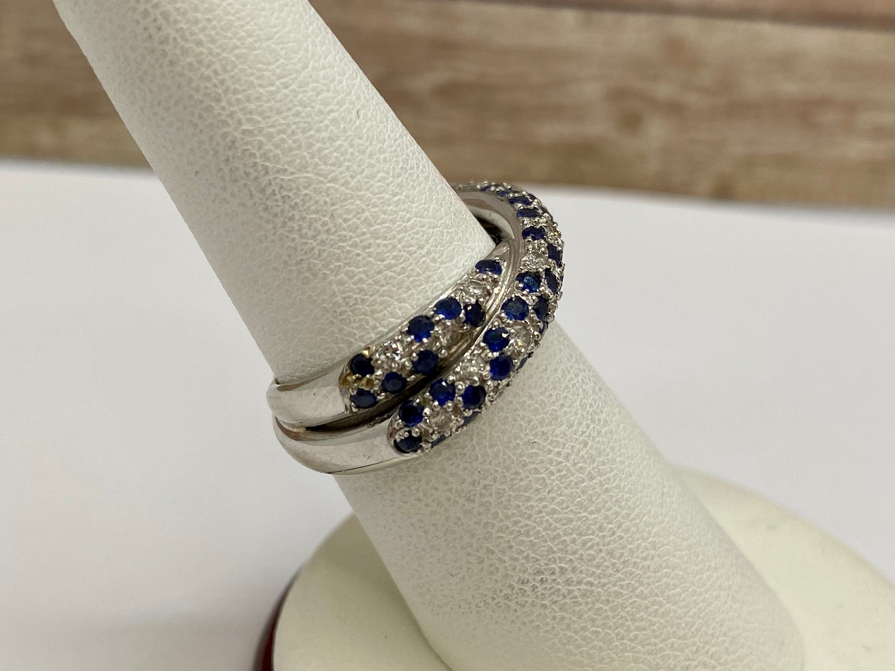 18K White Gold Twisted Ring: Sapphire and Diamond Accent