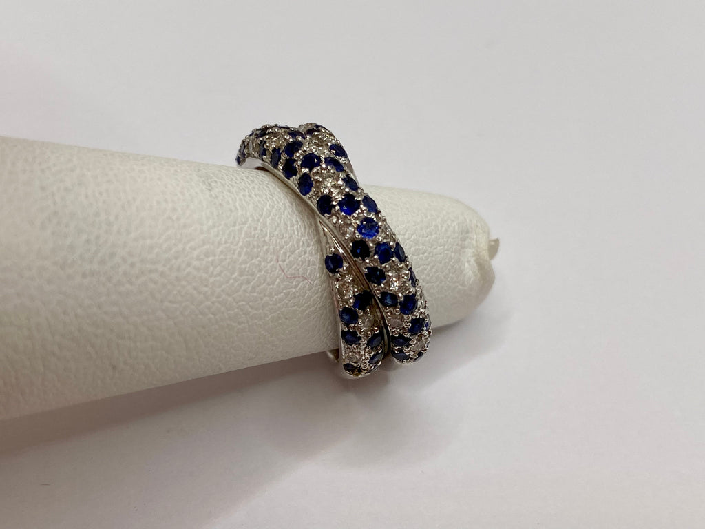 18K White Gold Twisted Ring: Sapphire and Diamond Accent