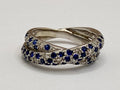 18K White Gold Twisted Ring: Sapphire and Diamond Accent