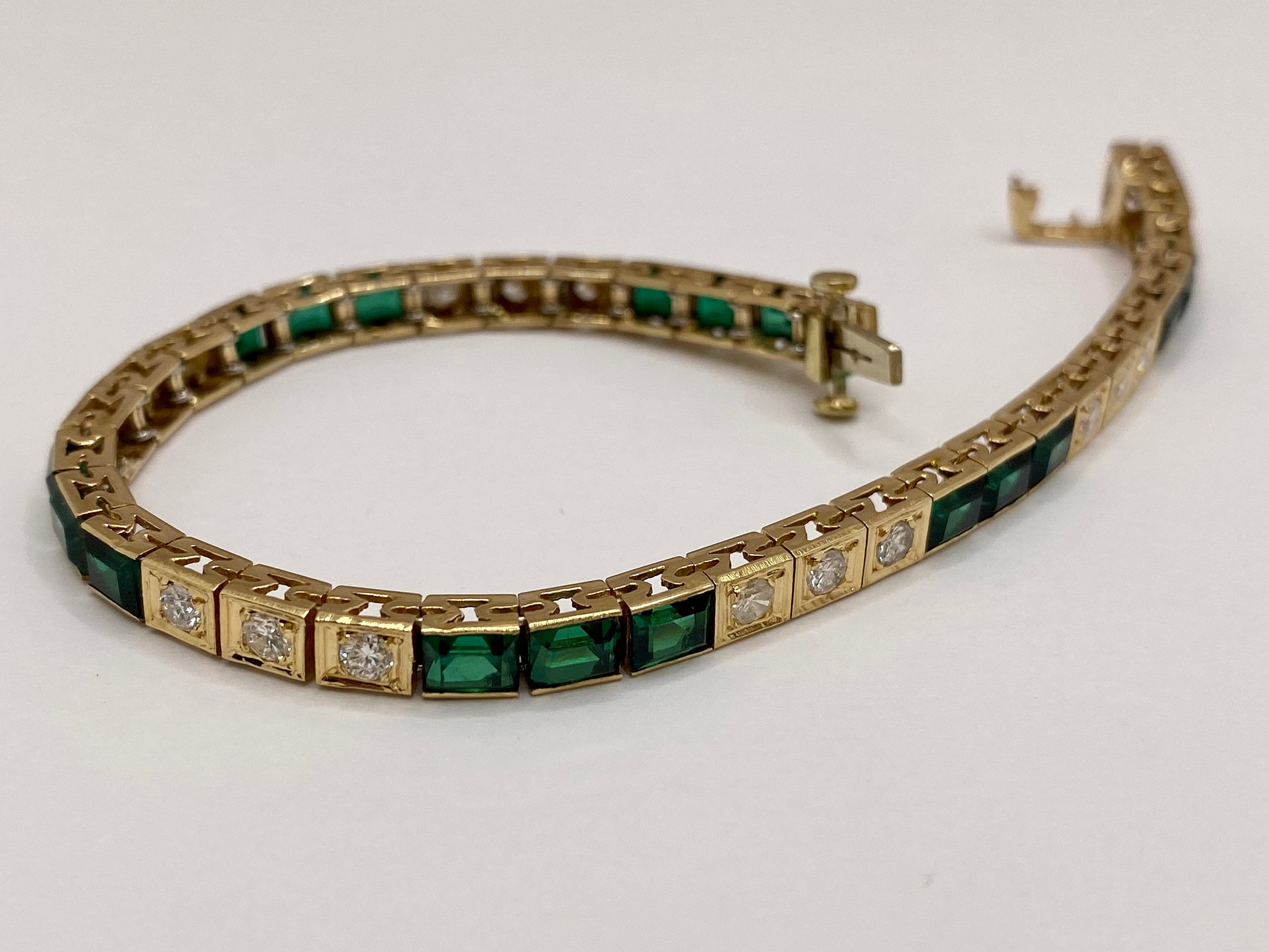 14K Yellow Gold Diamond And Emerald Tennis Bracelet!!!!